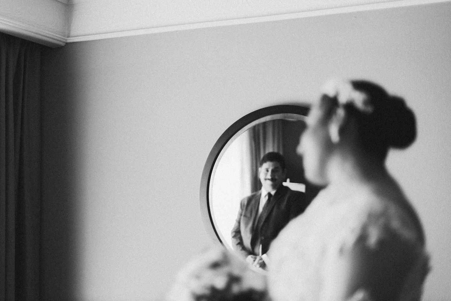Black and white photograph of wedding day preparations.