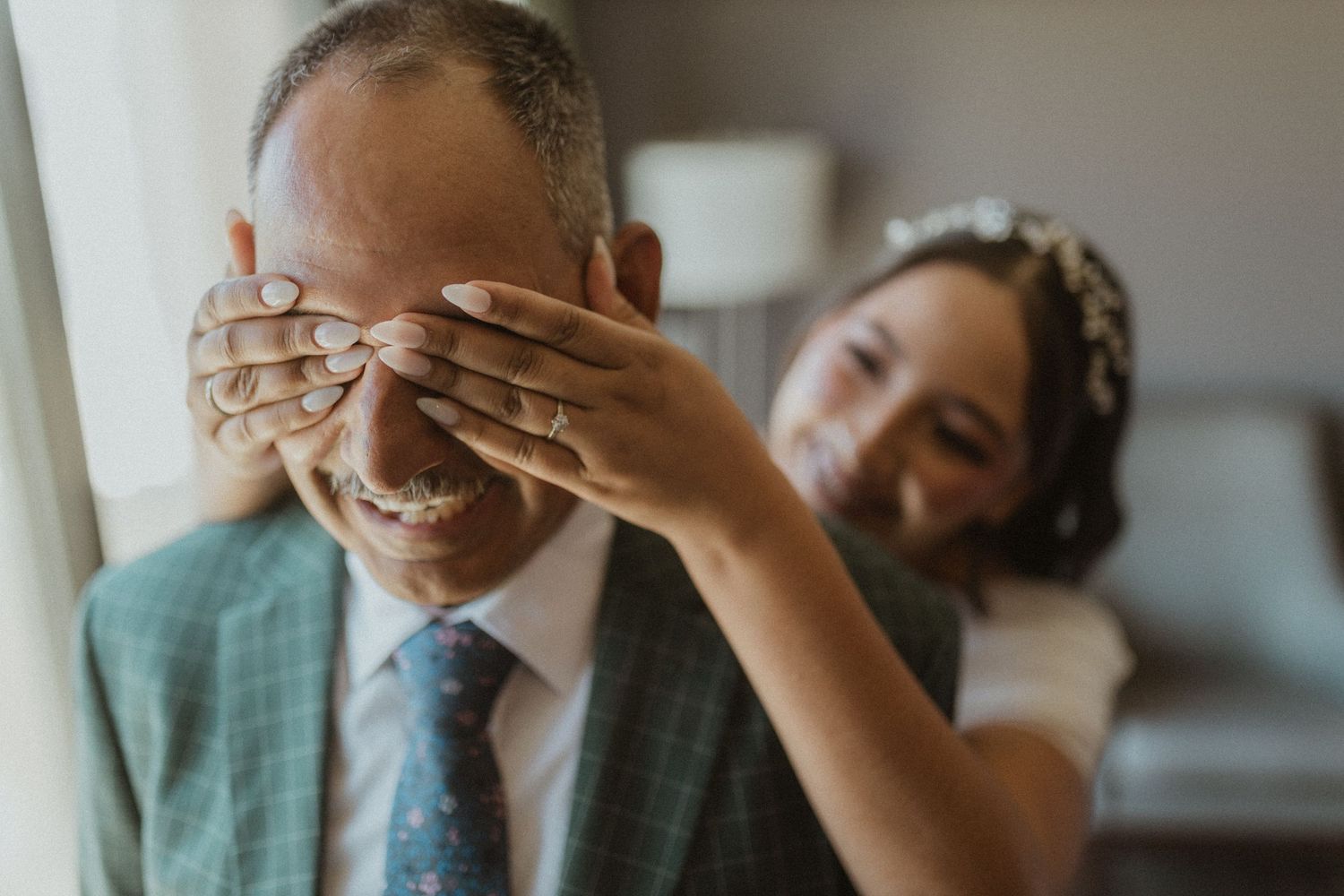 Wedding day first look reactions captured in candid emotional moments.