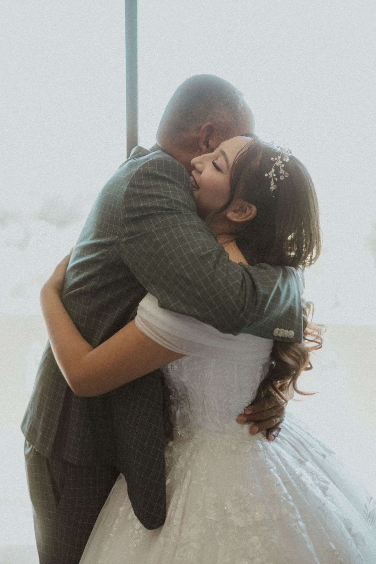 A series of candid wedding moments showing an emotional first look sequence.