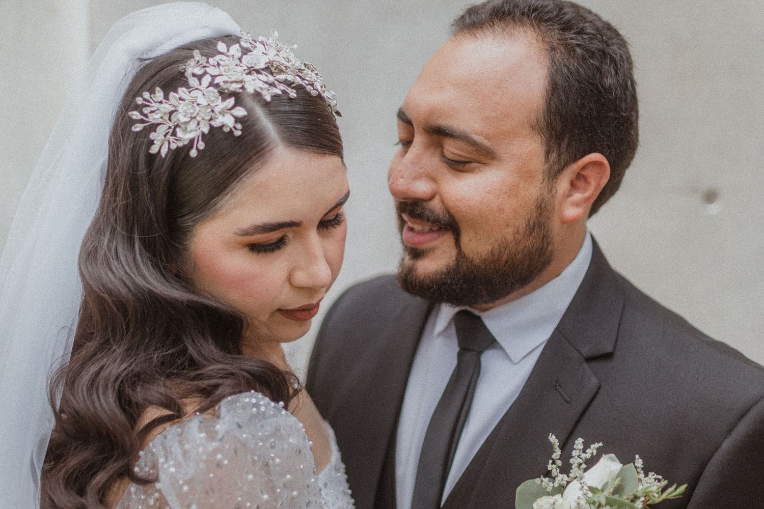 Candid wedding portraits showing joyful moments between newlyweds.