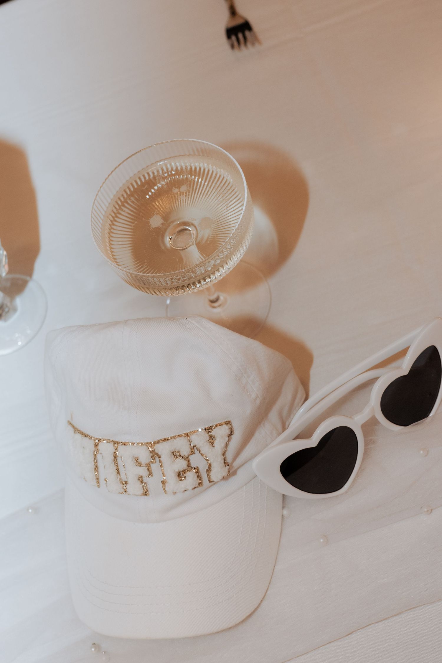 Five artistic white foam leaf patterns imprinted on white backgrounds arranged in a row show progressive detail shots.