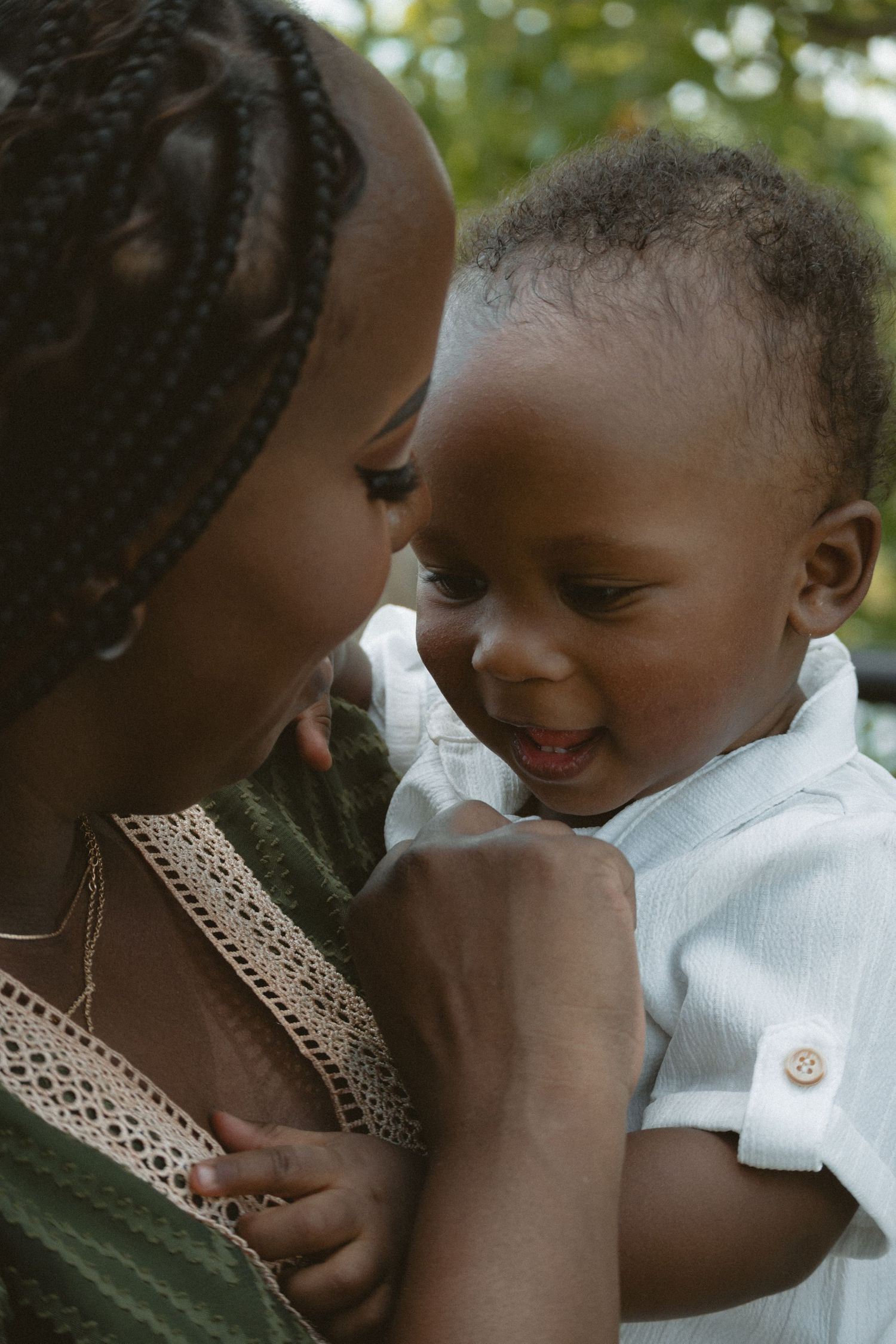 Two people share a tender embrace and gentle connection in an intimate sequence of photos.