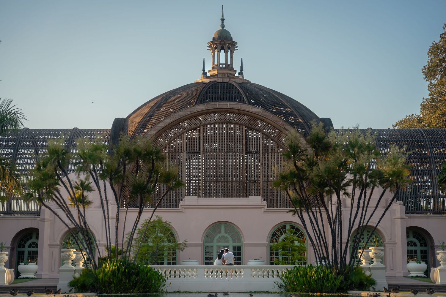 A collection of photos showing the San Diego Balboa Park buildings and architecture under a blue sky.