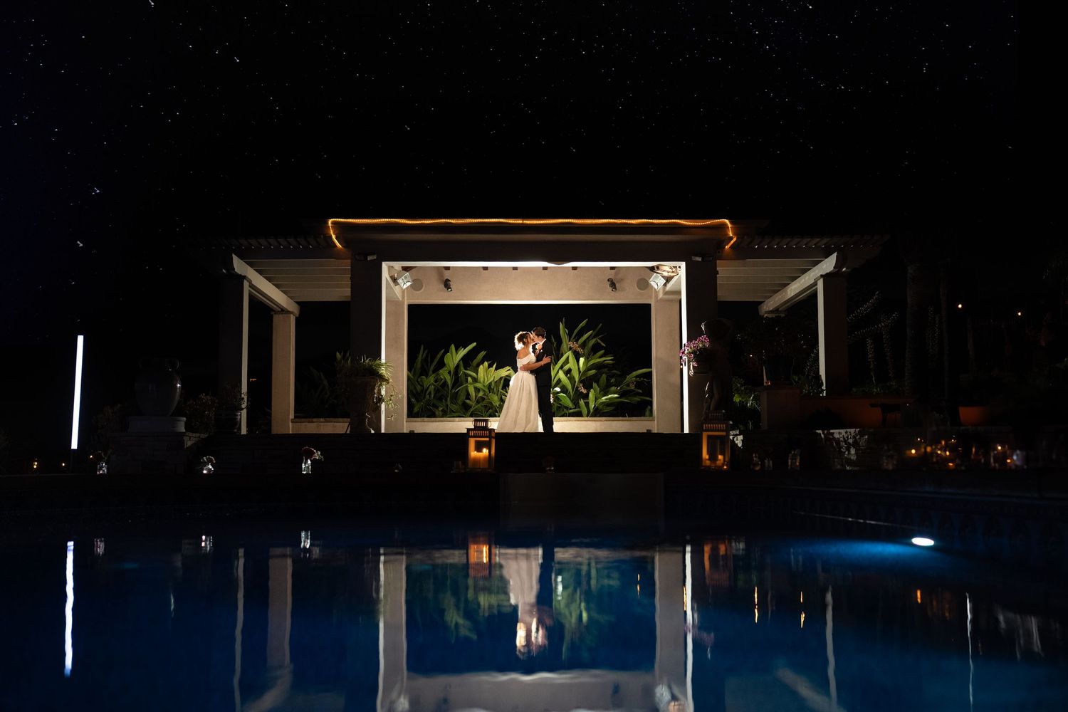 Wedding photography. Bride and groom kissing underneath the stars in San Diego California. Dramatic, Artistic, Romantic, Wedding photos