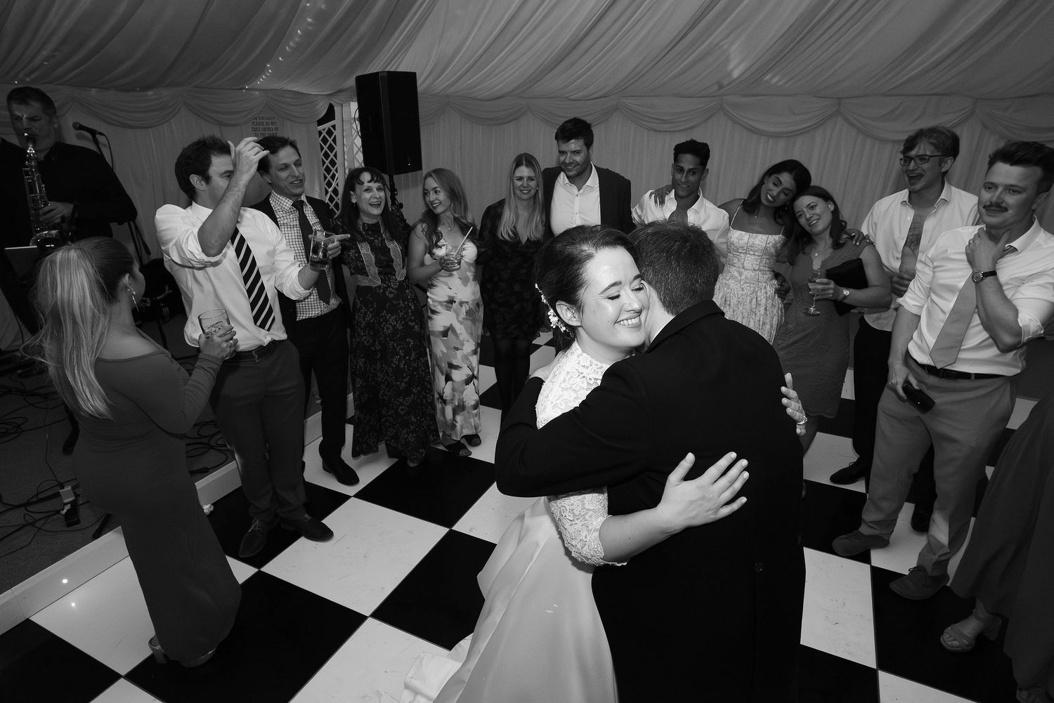 Black and white photos show couples dancing together at what appears to be a wedding reception or formal event.