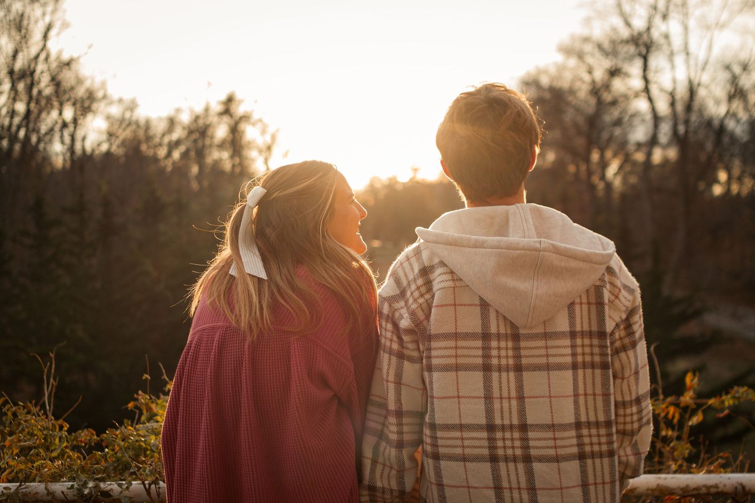 Couples photo in Allerton Park, capturing a couple gazing into the sunset. JDalbey Photography — couples portraits in Champaign IL.