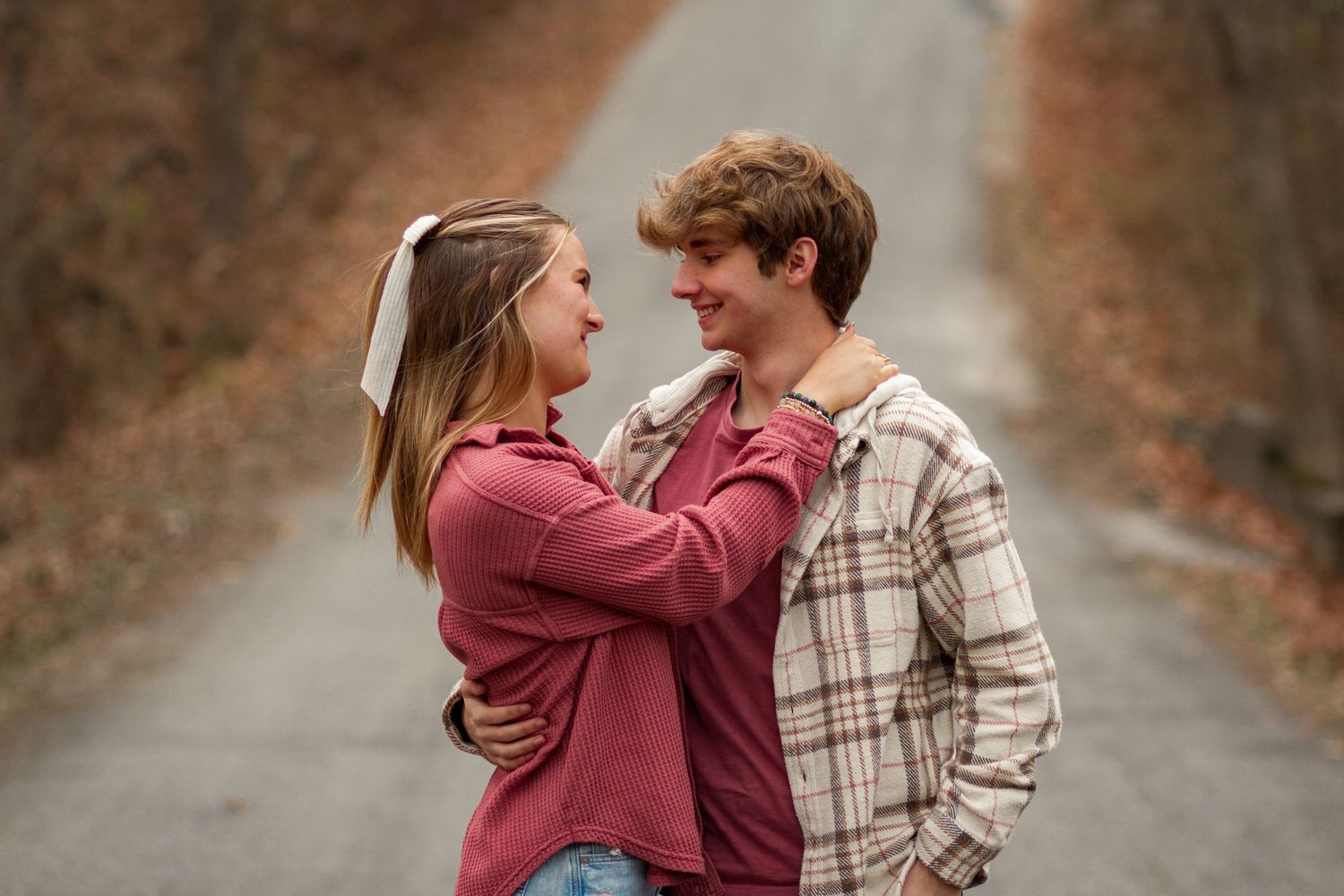 Couples photo in Allerton Park, capturing a couple gazing into each other's eyes. JDalbey Photography — couples portraits in Champaign IL.