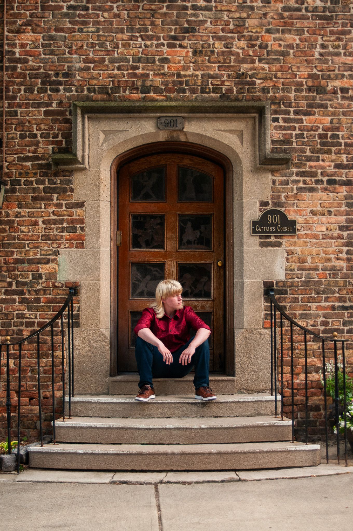 Series of poses on brick building steps showing different seating positions.