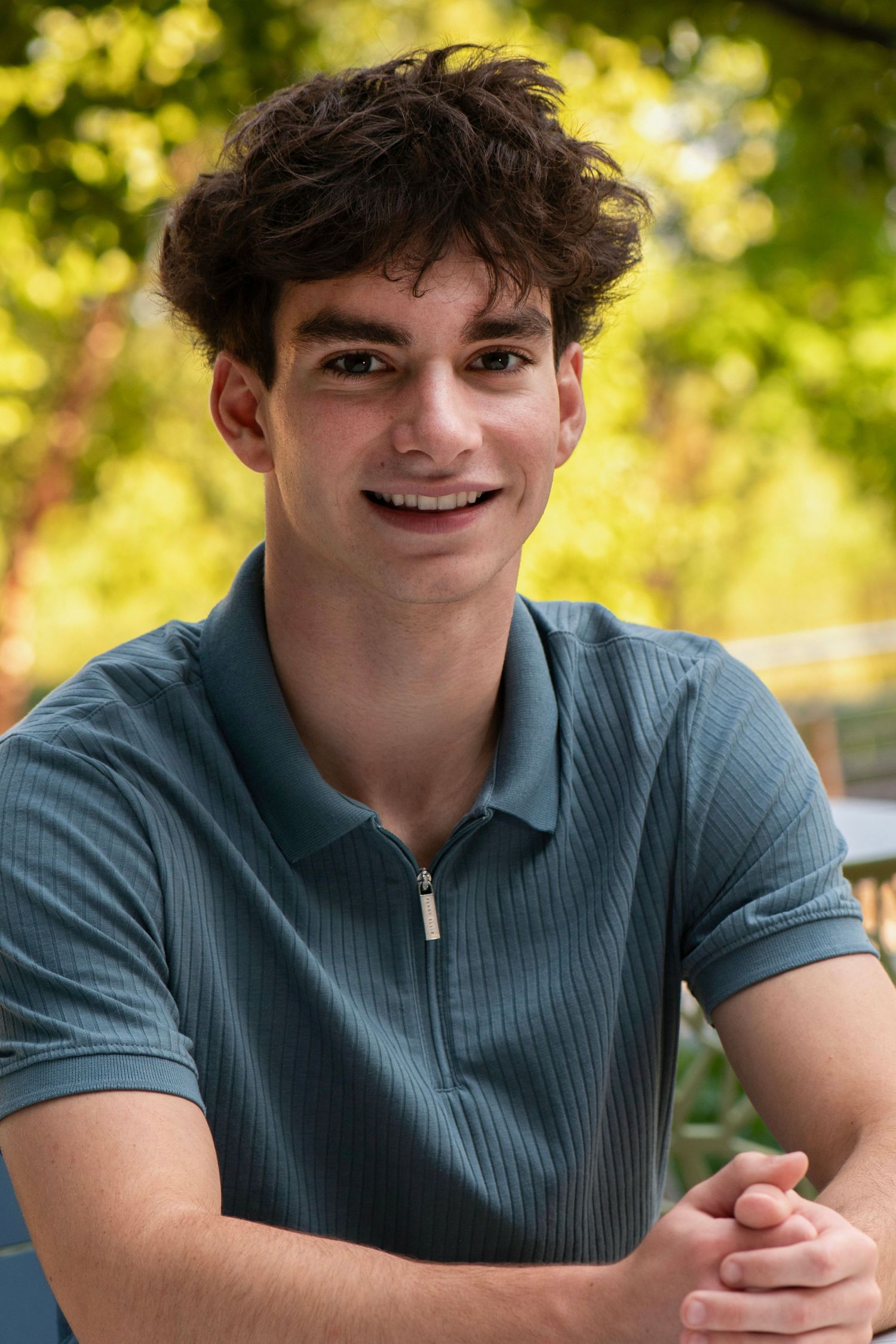 A series of five photos showing someone in a blue polo shirt sitting outdoors with natural lighting and greenery in background.