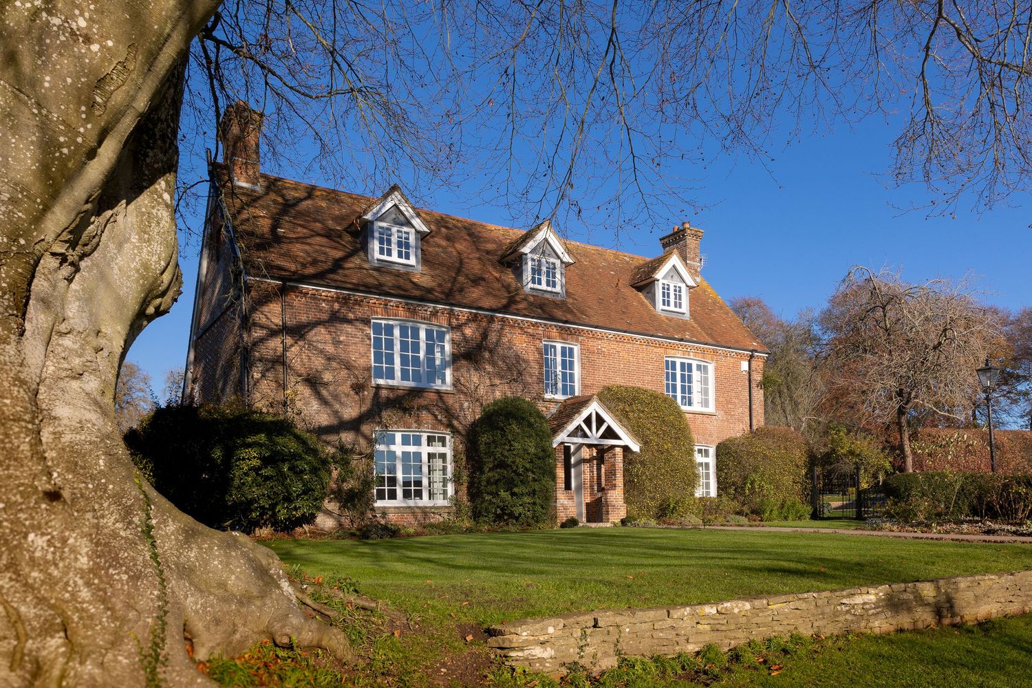 The Farmhouse at Clock Barn in Hampshire is one of several accommodation options on site for friends and family