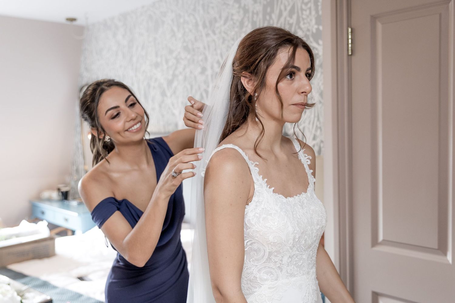 Close-up shots of wedding dress details and final preparations.