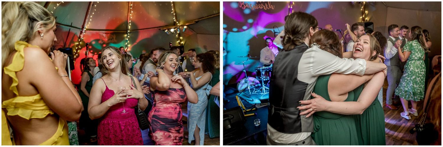 Guests dancing together during an energetic celebration at an indoor venue.