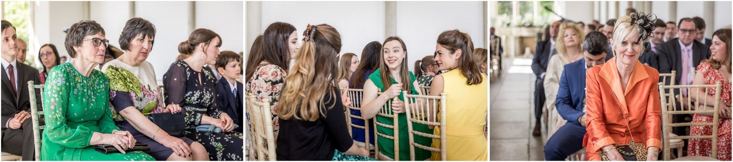 Wedding guests enjoying conversation and celebrations at an indoor reception.