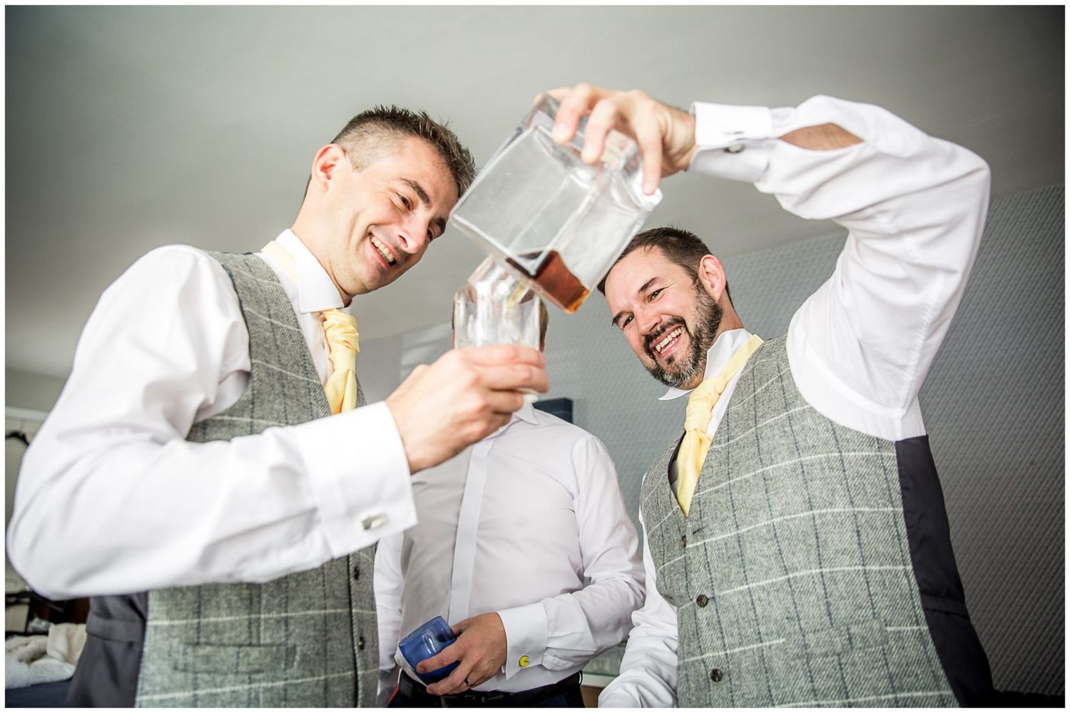 A sequence of photos showing a person in business attire making exaggerated expressions and gestures against a gray wall.