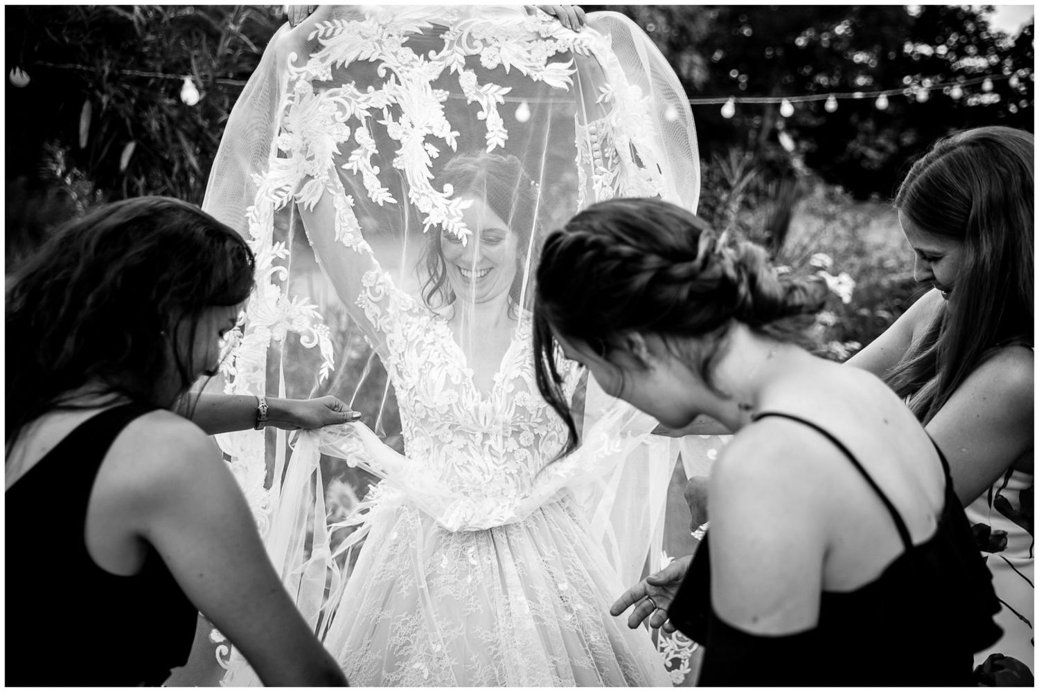 A black and white photo sequence showing a couple dancing together at a wedding reception.