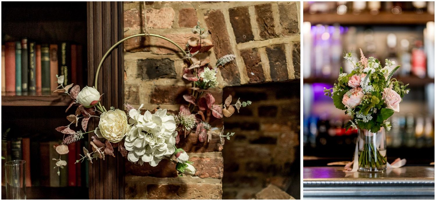 Wedding detail shots of floral arrangements and decorative elements in a rustic venue setting.