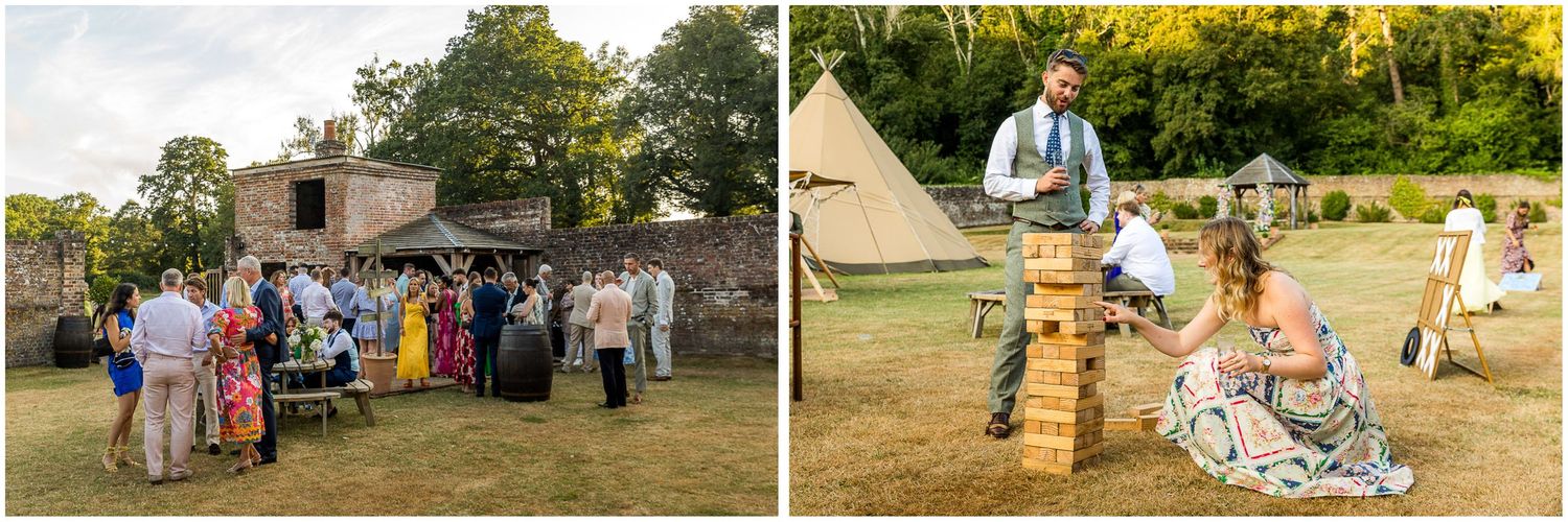 Wedding guests enjoying garden games on the lawn during the evening wedding celebration