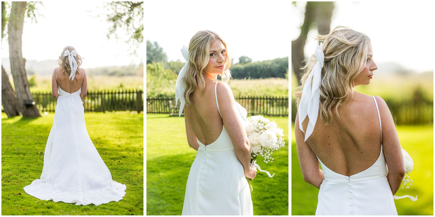 Romantic outdoor wedding photos captured in a lush green field during golden hour.