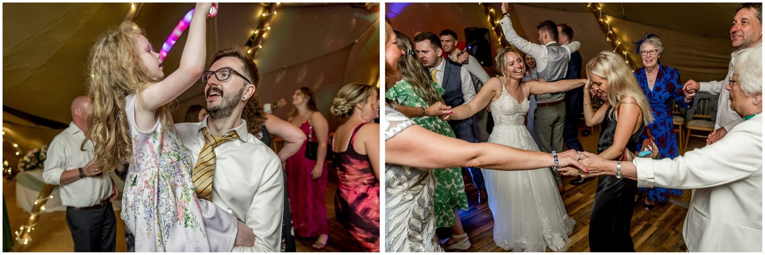 Wedding guests dancing enthusiastically on a crowded dance floor.