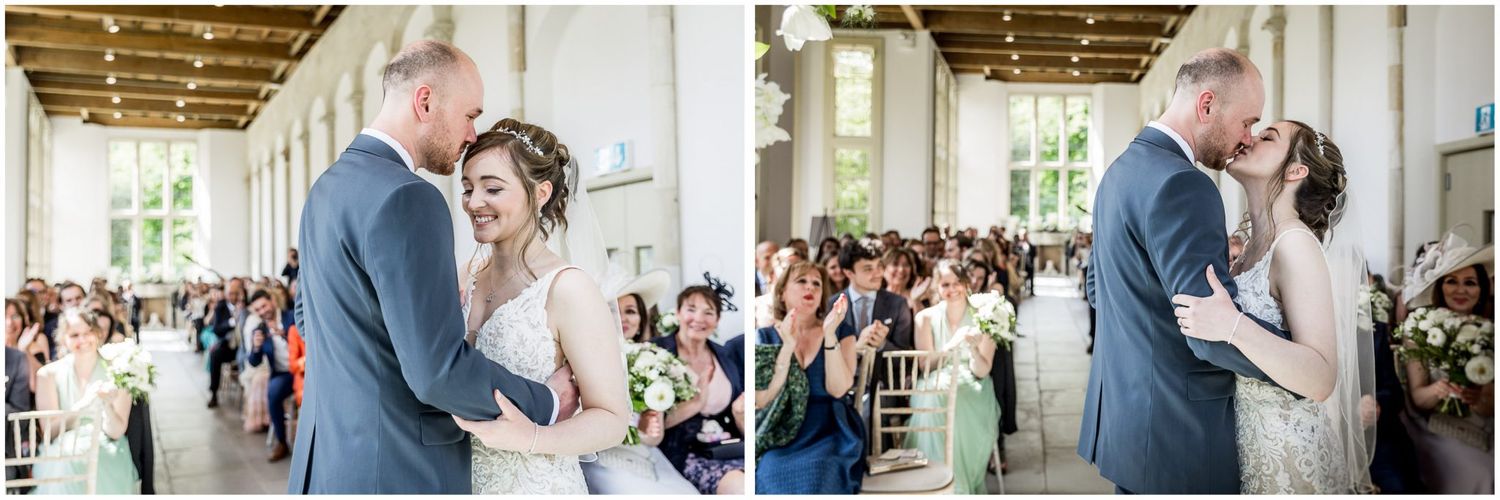 Wedding couple sharing a romantic dance moment in an elegant indoor venue.