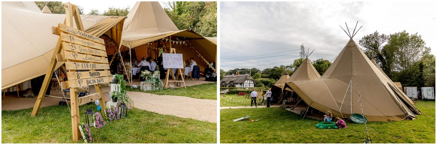 Rustic outdoor wedding venue with tipi tents set up in rolling countryside.