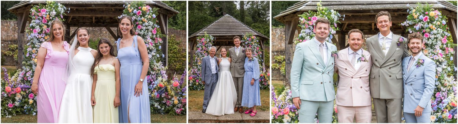 Group wedding photographs in the gardens of the Holywell Estate in Hampshire