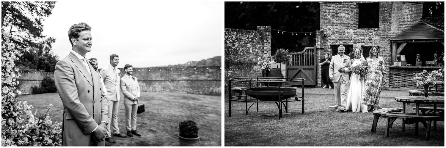 Black and white photograph of the groom watching as his bride arrives and walks down the aisle.
