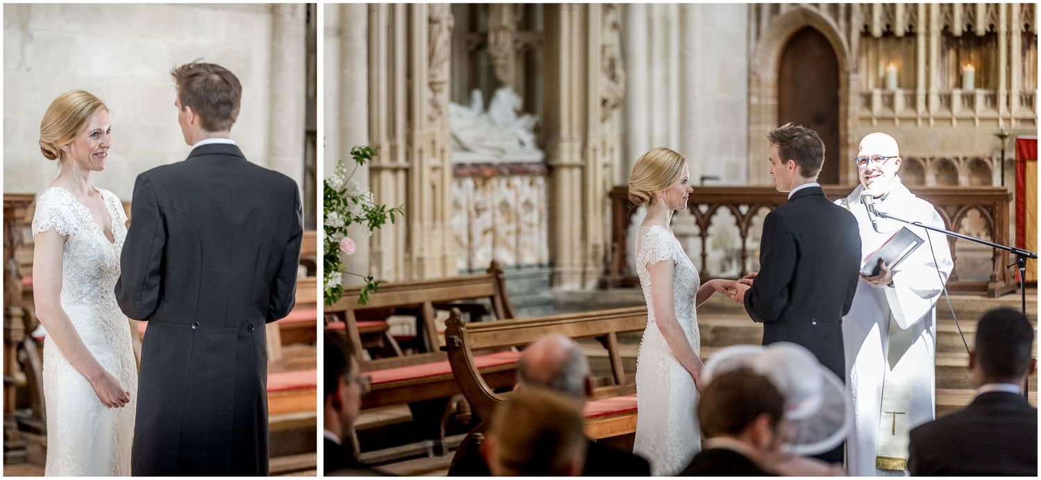 Wedding ceremony moments in traditional church with stone columns and arches.