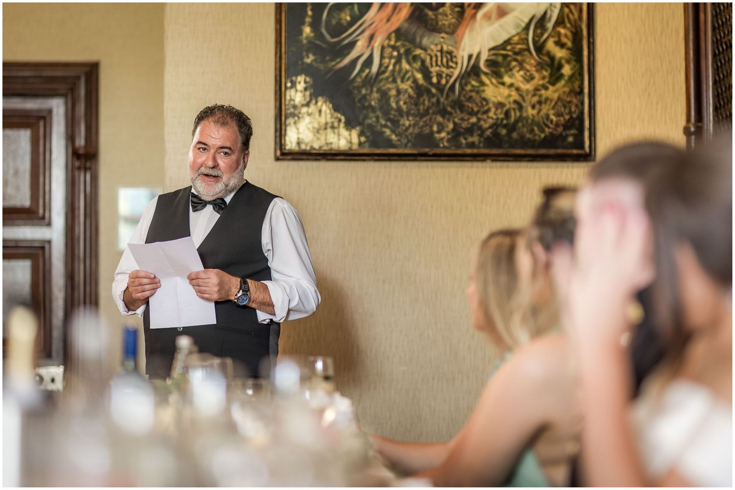 Father of the bride gives his wedding speech in the library dining room at The Elvetham hotel