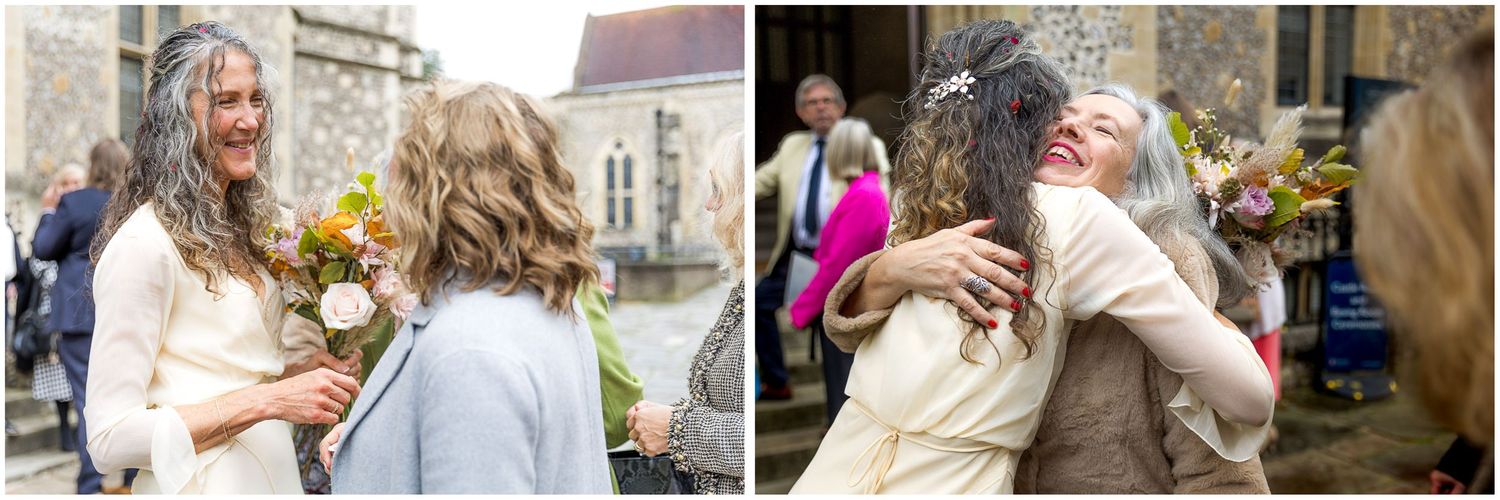 People sharing warm embraces and emotional moments during outdoor gatherings and celebrations.