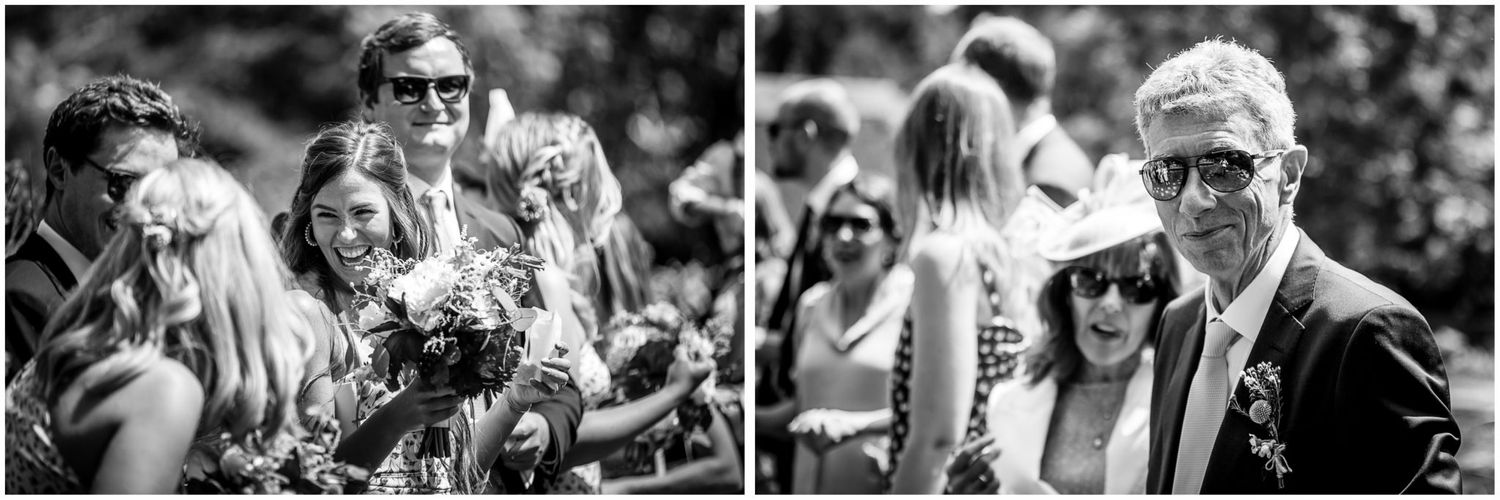 Black and white candid moments of wedding guests celebrating outdoors.