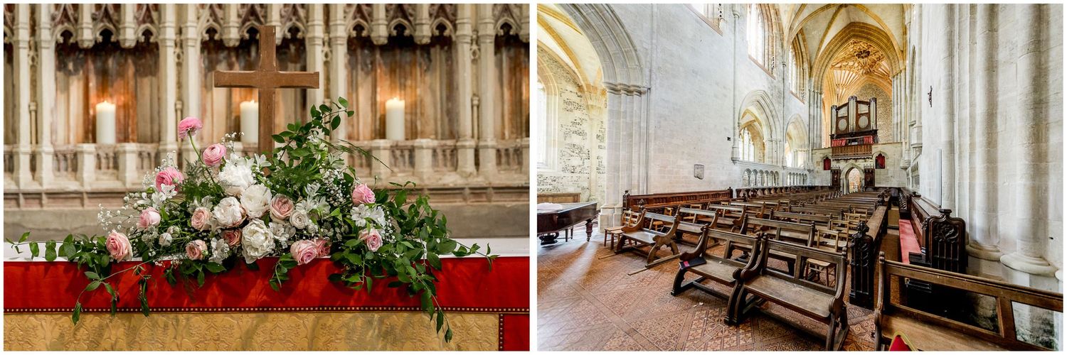 Church interior with ornate architecture and wooden pews prepared for a wedding ceremony.