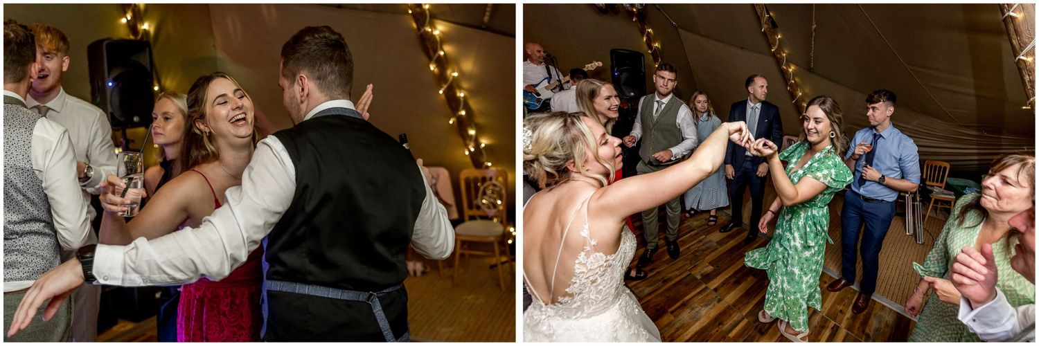 Guests celebrating and dancing inside a festively decorated reception venue.