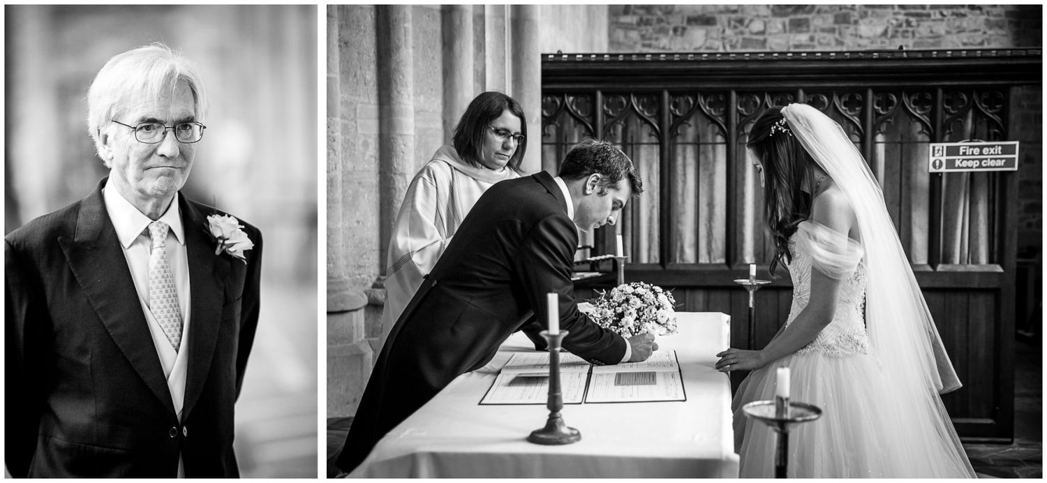 Black and white wedding photography in a historic church cloister with elegant architectural details.