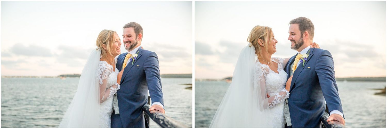 A romantic couple embraces on a beach at sunset while sharing intimate moments during their coastal photoshoot.