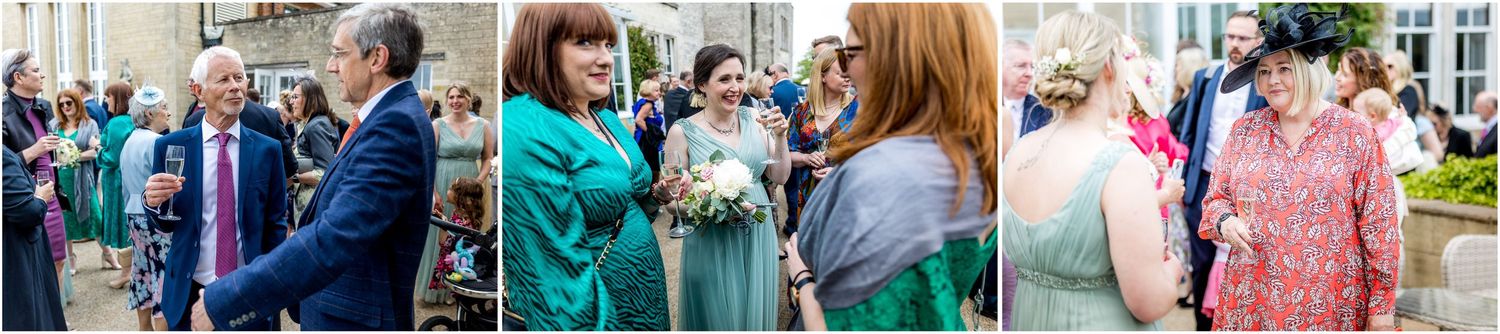 Wedding party members pose together outdoors in formal attire.