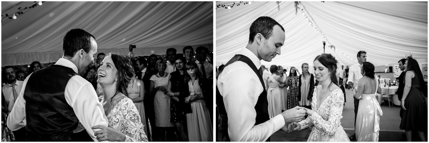 Guests dancing and celebrating at an elegant wedding reception in black and white.