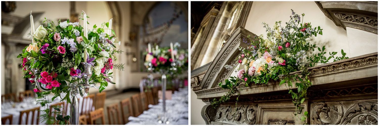 Elegant wedding decor featuring floral arrangements and vintage architectural details in a rustic venue setting.