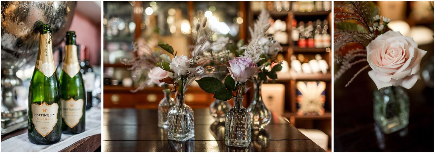 Elegant wedding reception details with crystal glassware, floral centerpieces, and romantic candlelight on tables.
