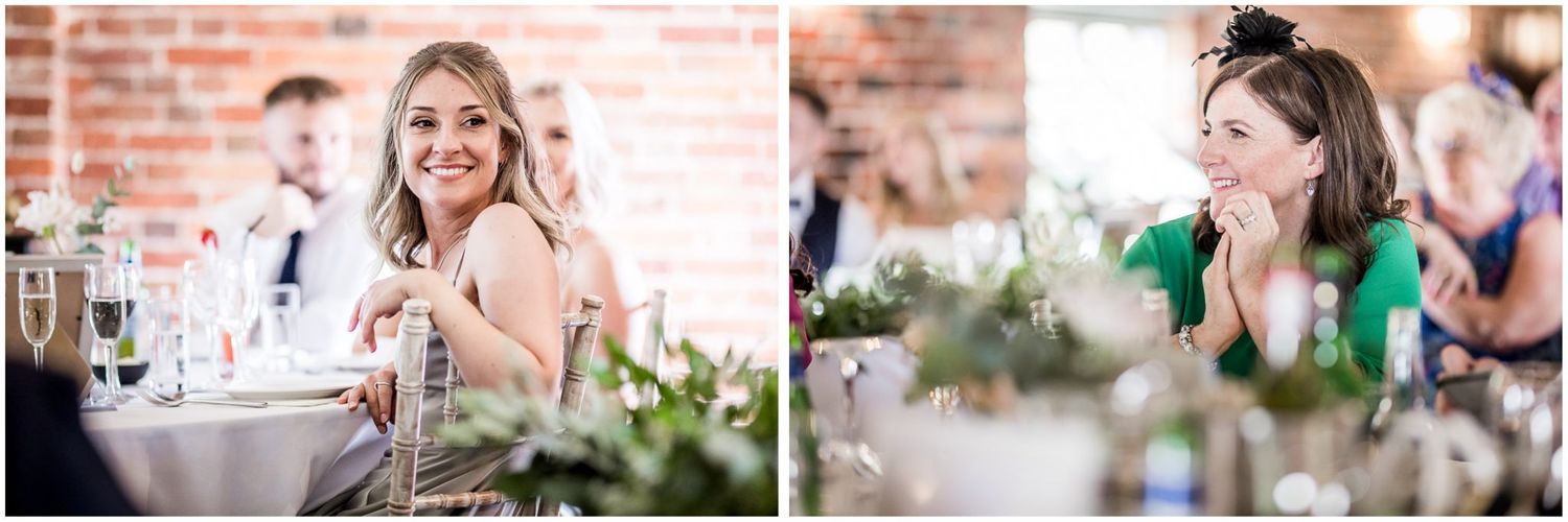 Wedding celebration candid moments captured at an industrial-chic venue with brick walls.