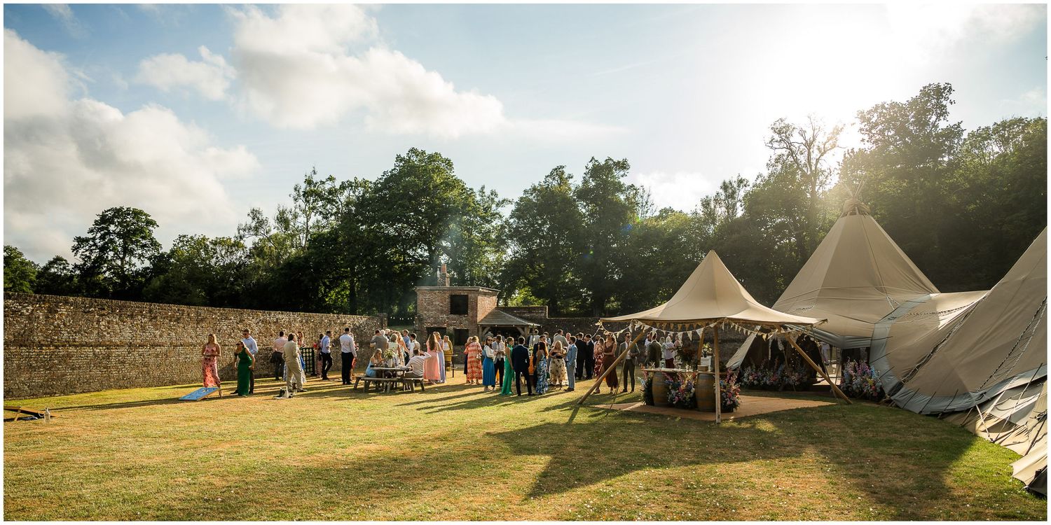 The wedding reception marquee in the walled garden of the Holywell Estate in the evening light