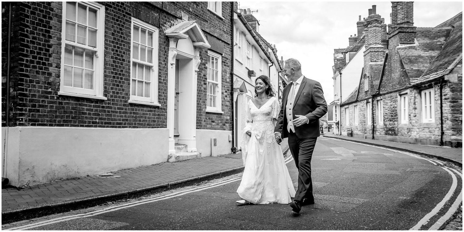 Black and white architectural shots of historic buildings and streets create a timeless wedding backdrop.