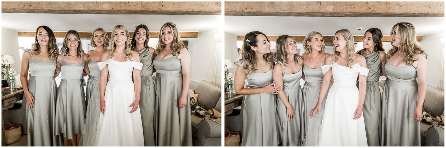 Wedding party lineup showing bridesmaids in matching sage green dresses.