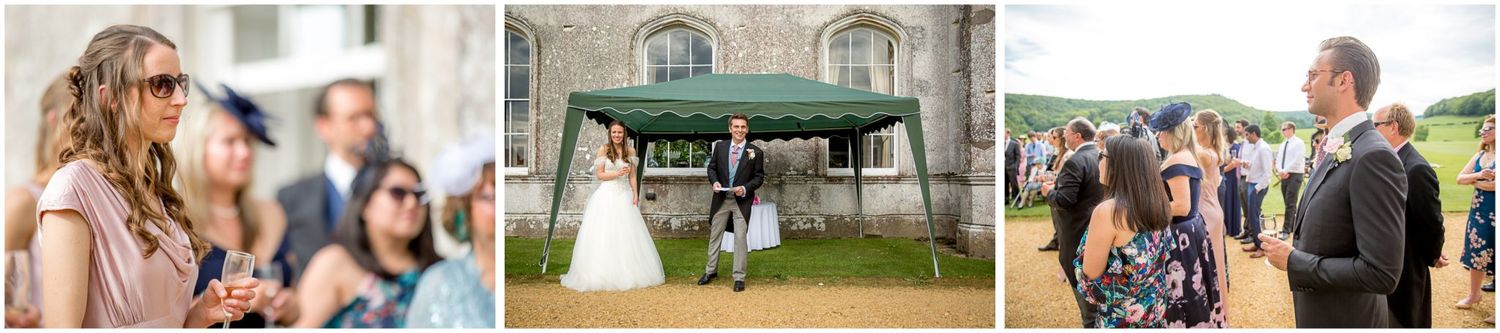 Wedding guests mingle and celebrate during an outdoor reception near a rustic barn venue.