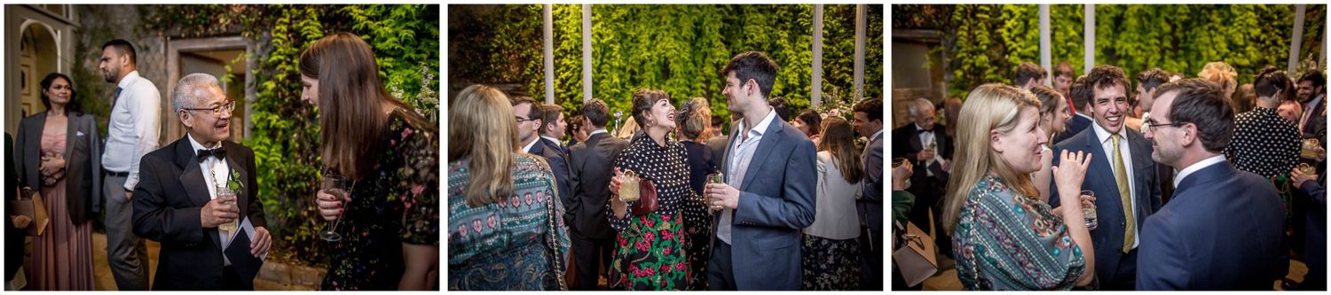 Evening wedding reception with guests dancing and celebrating.