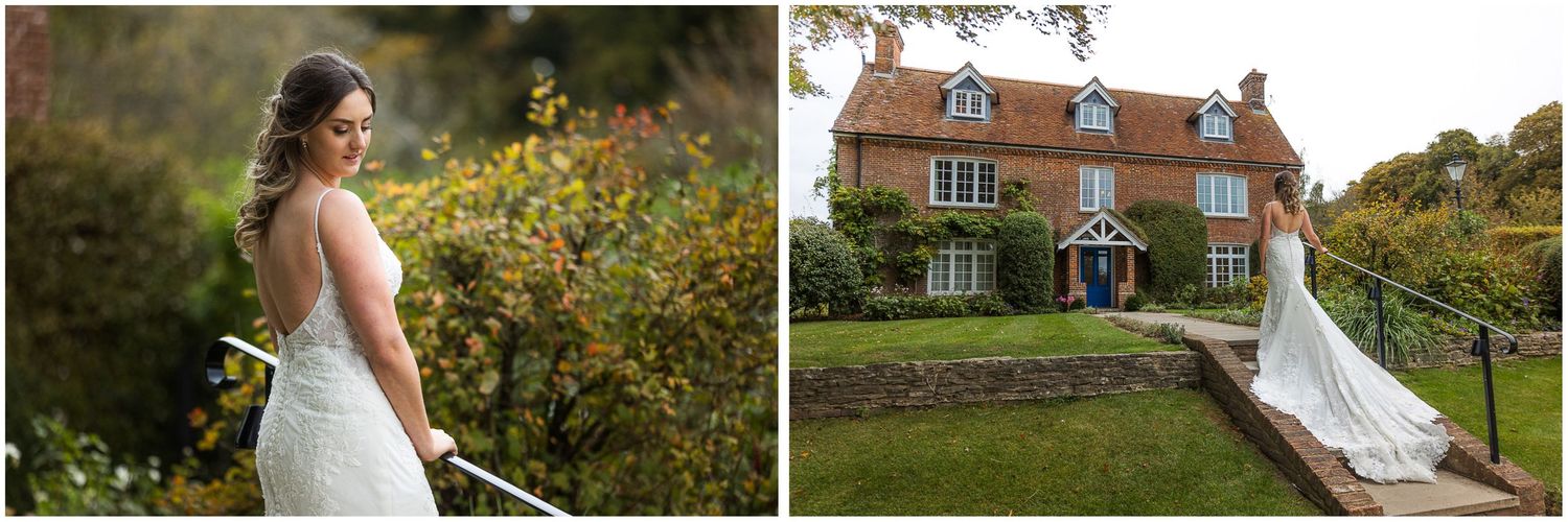 Portrait of bride on her wedding day outside the farmhouse accommodation at Hampshire's Clock Barn wedding venue