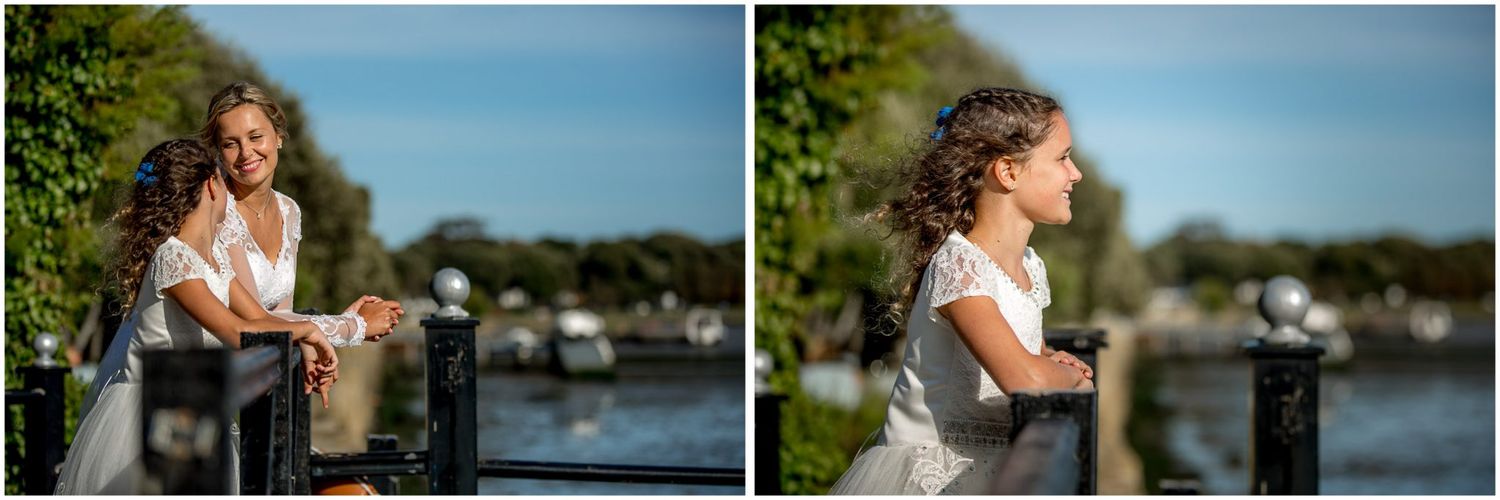 A couple enjoys a romantic boat ride along a scenic waterway during a sunset engagement photo session.