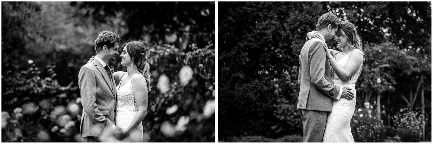 Black and white wedding couple photography in the gardens of Clock Barn, wedding venue in Hampshire