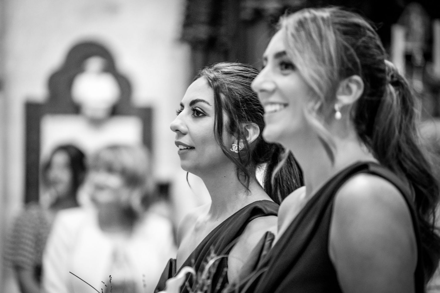 Black and white candid shots capture joyful moments during an elegant wedding celebration.