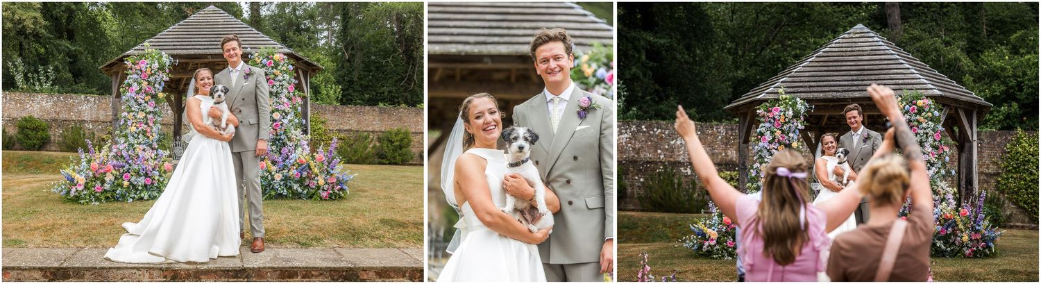 The wedding couple pose in front of the gazebo at the Holywell Estate